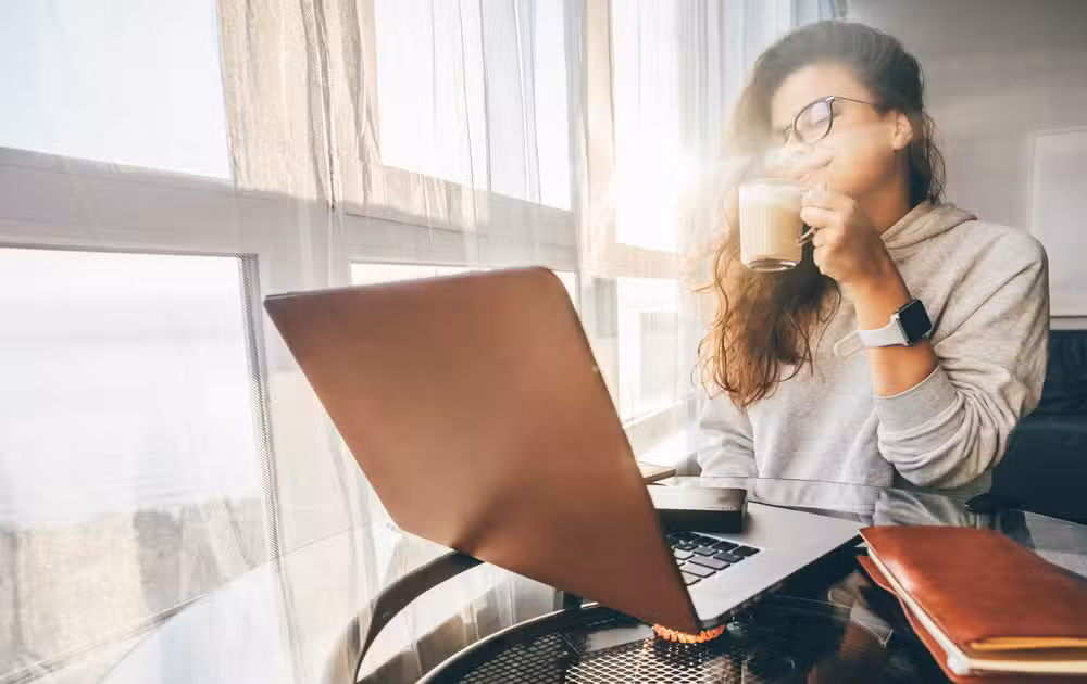 Day in the life of executive virtual assistant starting workday at professional home office with morning routine