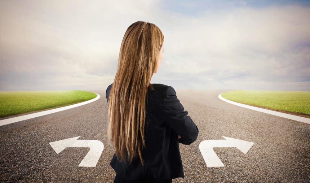 woman standing on split path