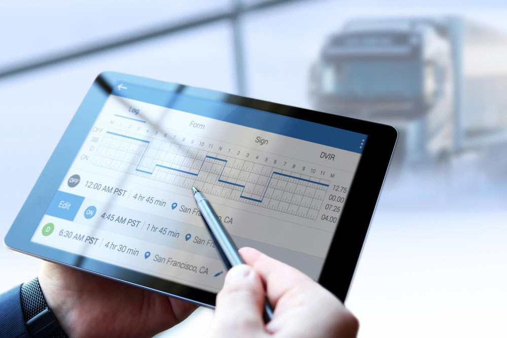 A close-up of a digital project management dashboard on a tablet next to a structured weekly planner, representing the operational systems used by high-performing executive assistants.
